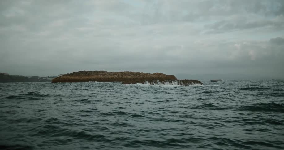 A small island surrounded by the ocean
