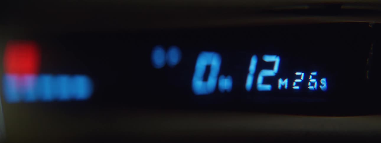 Close up of the numbers on the display of a digital clock