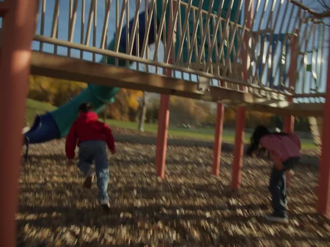 Children are running through the playground
