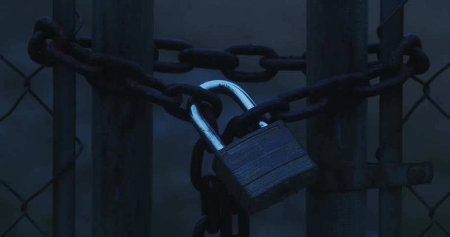 Padlock on a chainlink fence