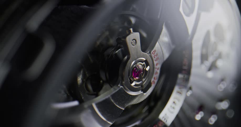 Closeup of wristwatch rotor spinning