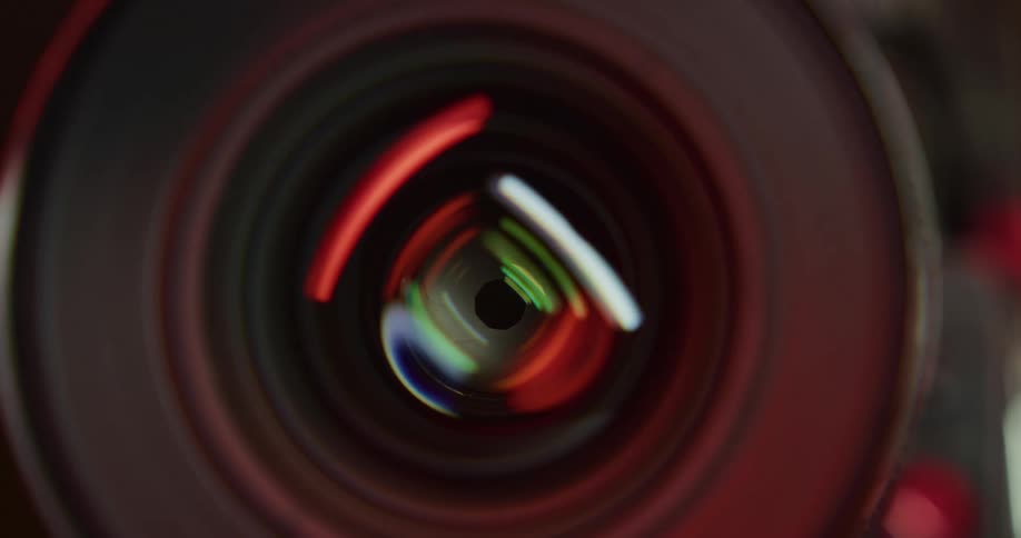 The light reflects on the camera lens