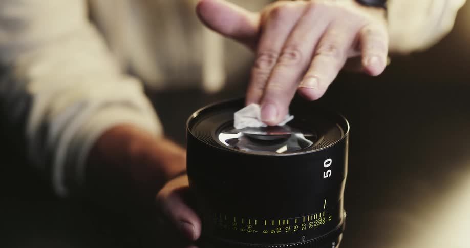 Close up view of a person cleaning an object