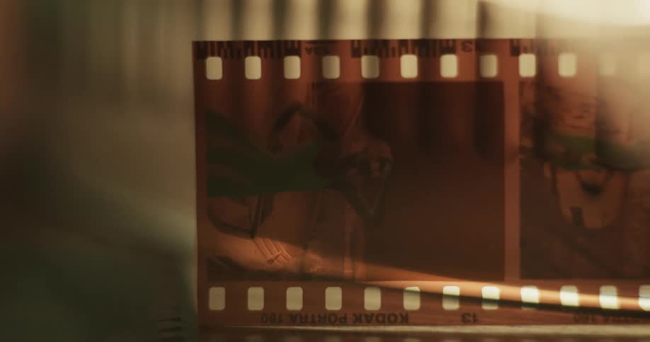 Ray of light glares across film negatives