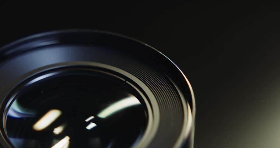 Close up view of lens on a photography camera is displayed