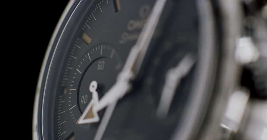 Close up of silver wristwatch running