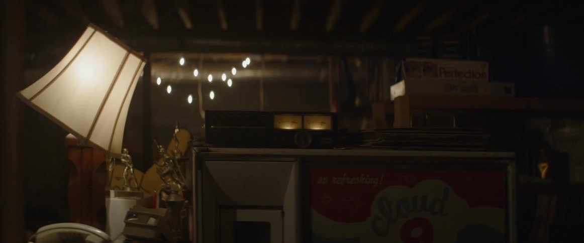 An old radio, a lamp and some exterior lights turn on