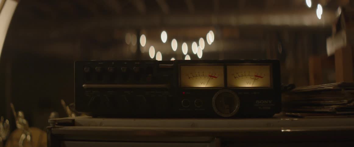 Needles on an old radio bounce back and forth