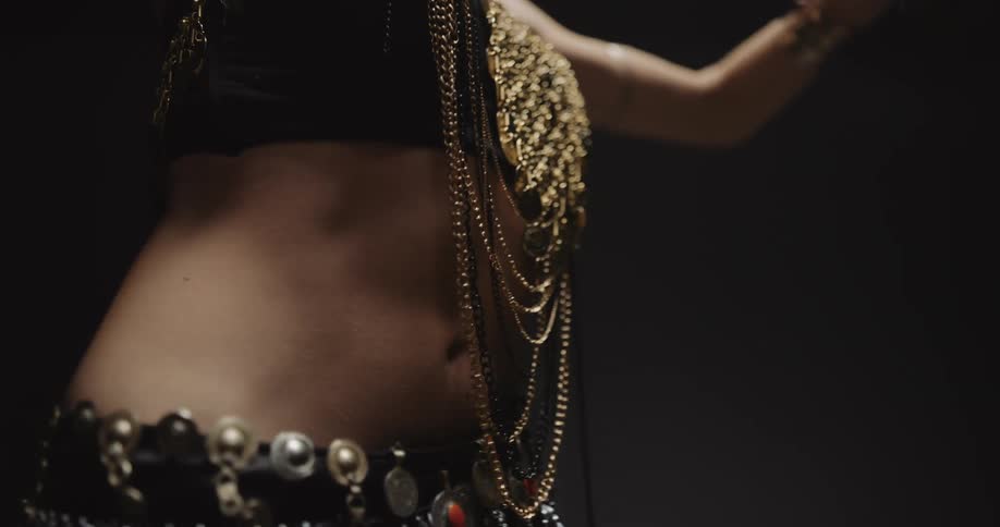 A woman is belly dancing