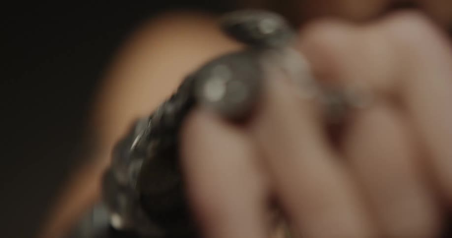 A woman is waving her hands around
