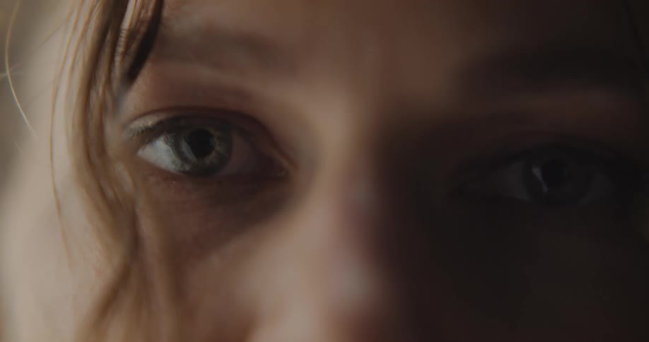 Close up of a sad female wearing a nose ring