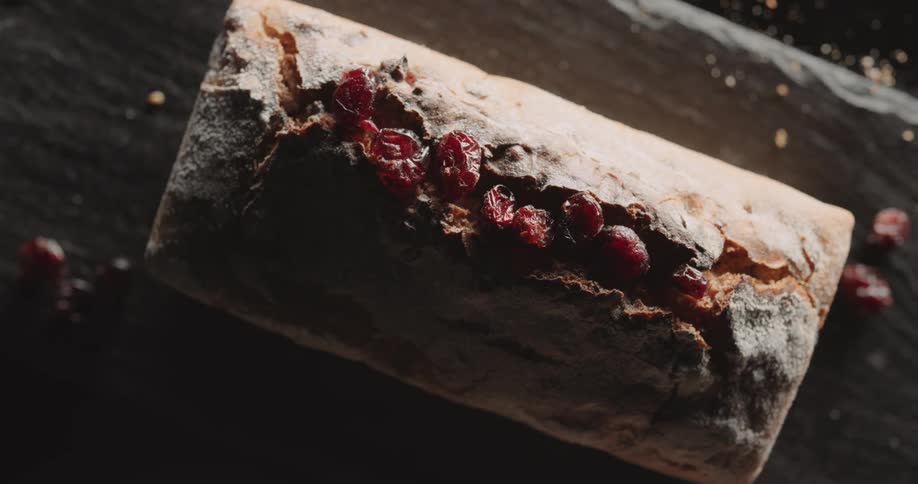 A loaf of bread is on a table display