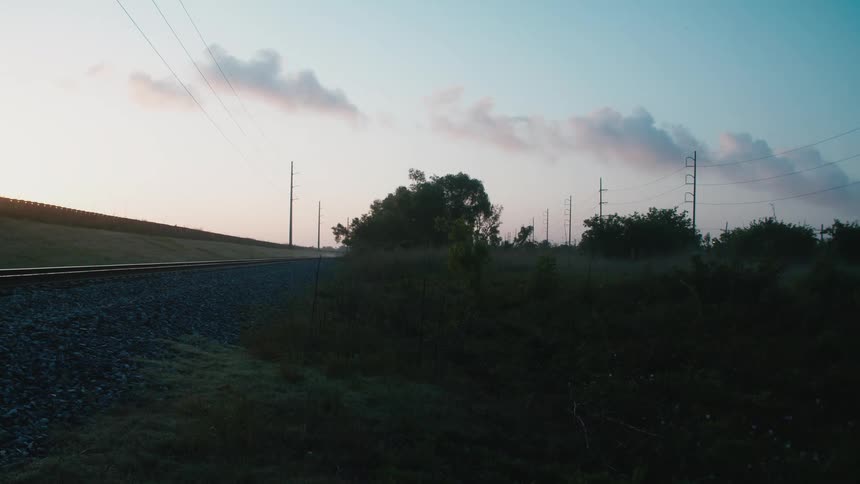 The sun is rising on the hills