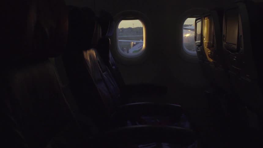 The inside of an airplane is dark