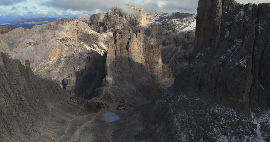 Aerial view of a mountainous landscape is displayed