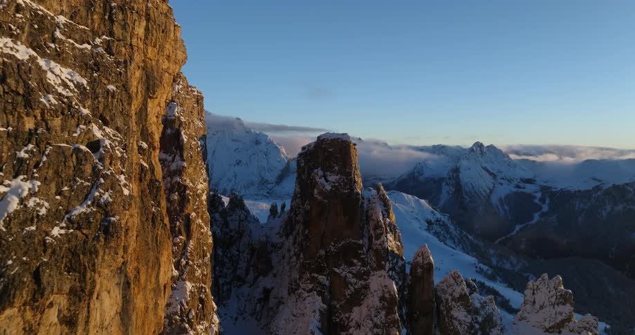 Aerial view of mountains during the winter season is displayed
