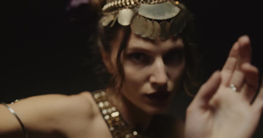 Close up view of a woman dancing is displayed