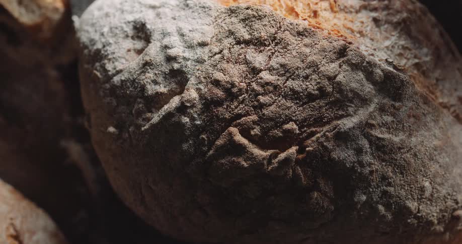 A loaf of crusty bread on a countertop