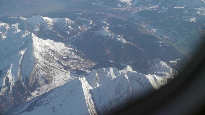 Snow covered mountains in the day