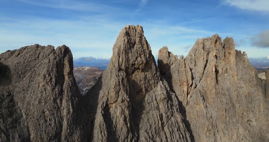 The view is of mountains and landscapes located in the day time