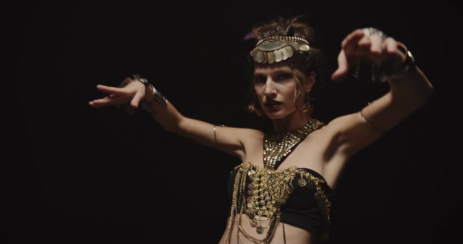 A woman is performing a dance by herself