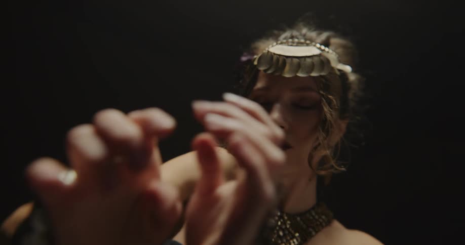 Close up view of a woman dancing by herself