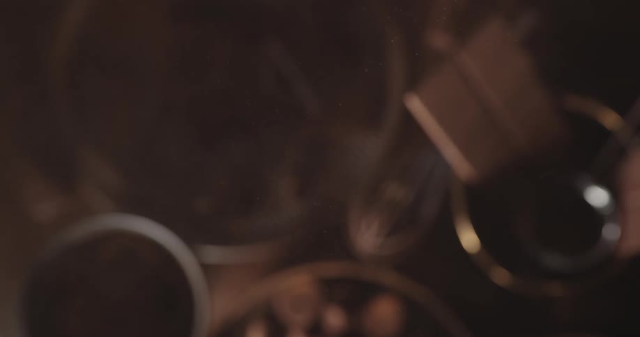 Dust lingers in the air over a table with bowls and cookies