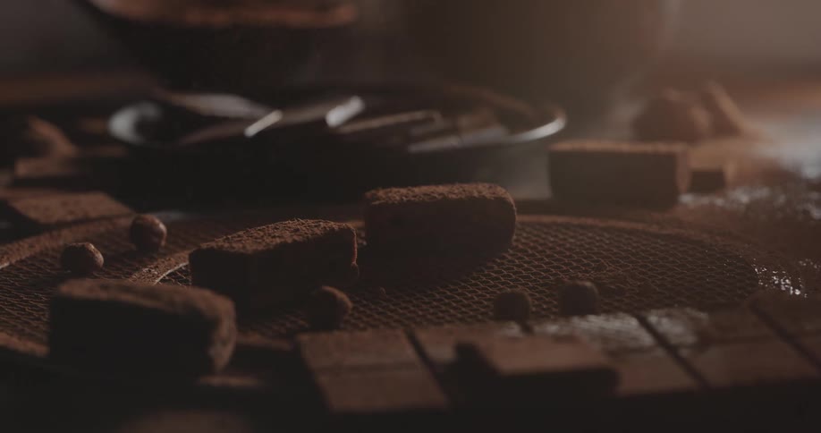 There is chocolate on the table with the powder everywhere