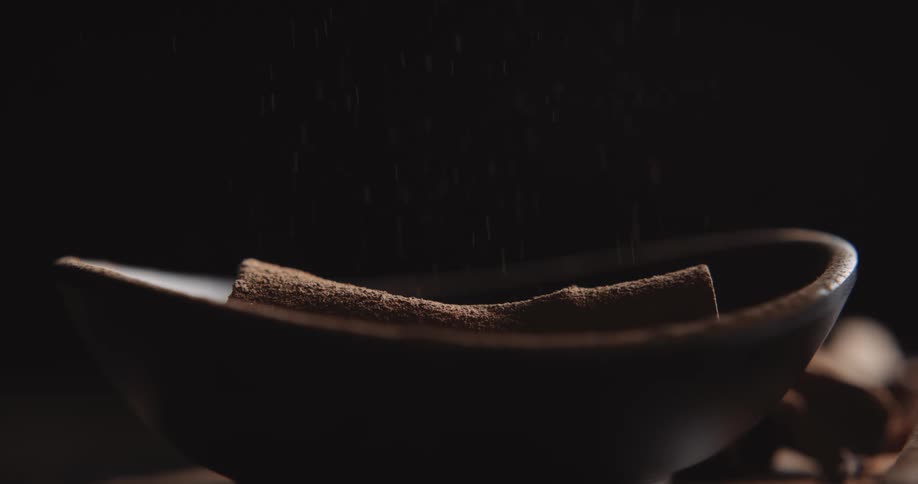 The bowl is full of chocolate powder