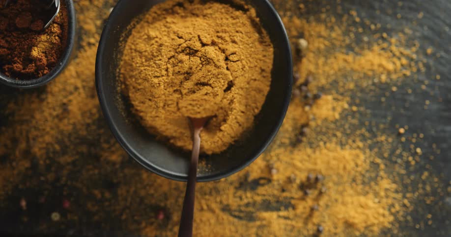 Closeup of a bowl of cinnamon powder