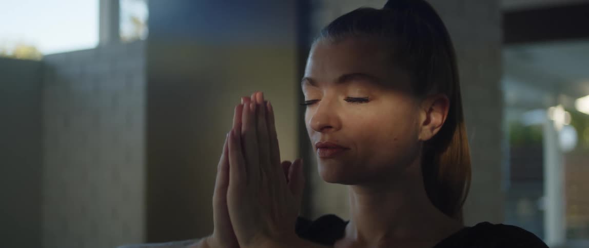 A woman is doing yoga