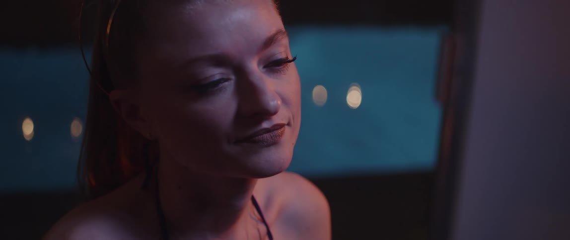 A woman is smiling at home