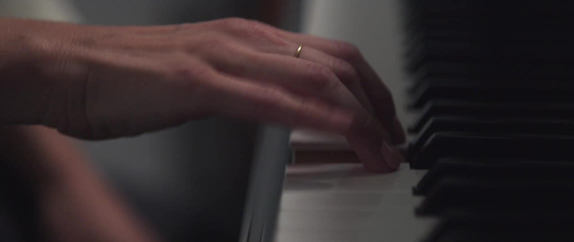 A person is playing the piano
