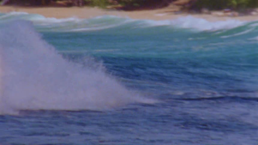Waves rolling and crashing into the beach