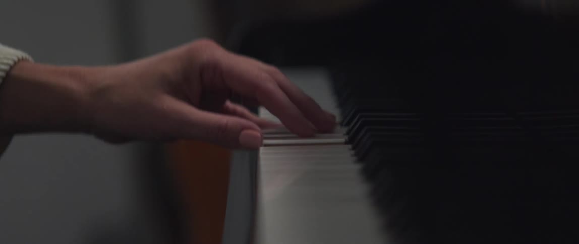 A person is playing the piano
