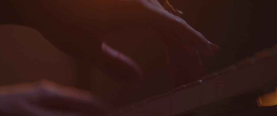 A person is playing the piano