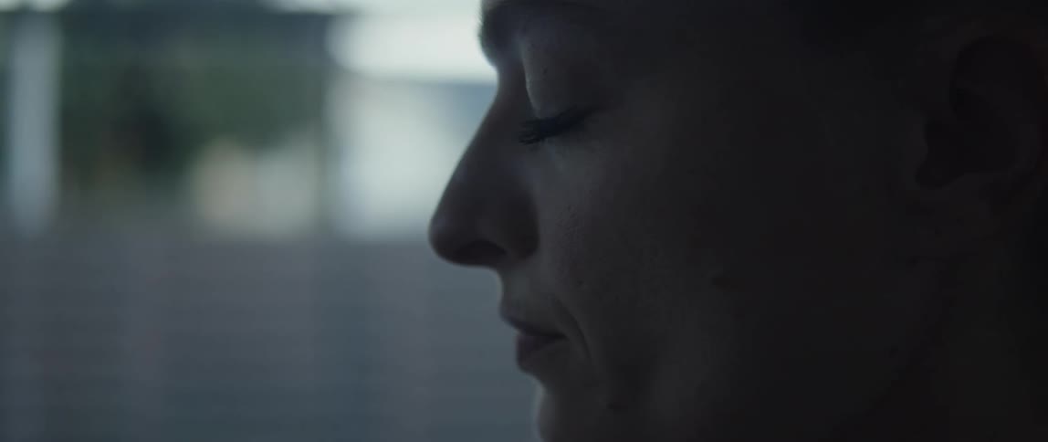 Close up view of a woman is displayed
