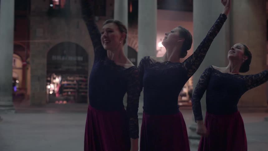 A trio of dancers performing