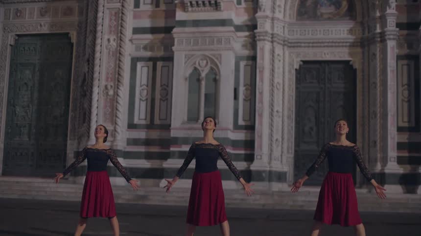 Dancers pose after a performance