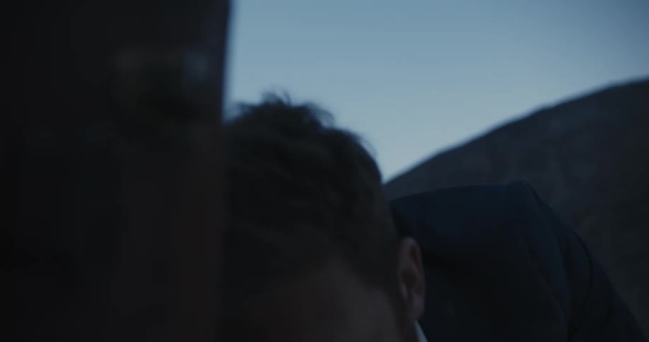 A man is crawling outdoors in the wilderness