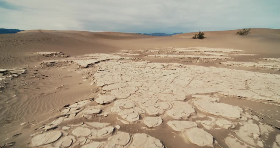 Cracks form on the surface of a dry desert
