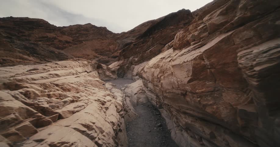 A canyon has been carved into a mountain range