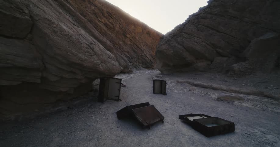 Abandoned set of empty luggage thrown in the valley