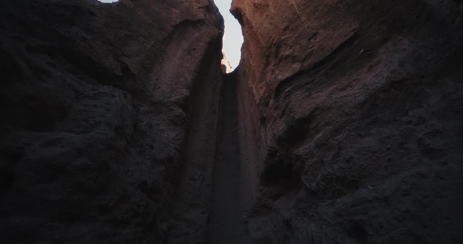 A view between two rock formations is displayed