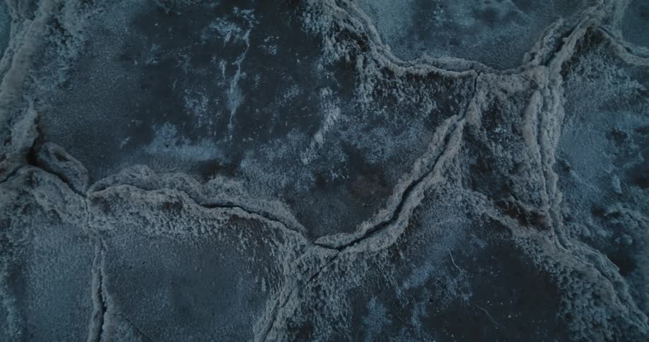Large cracks are in a thick sheet of ice