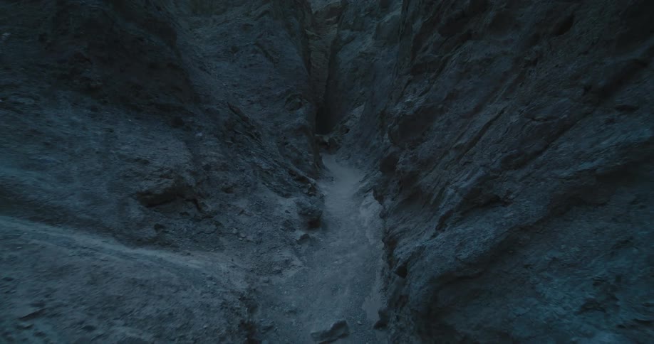 A trail runs through the mountains