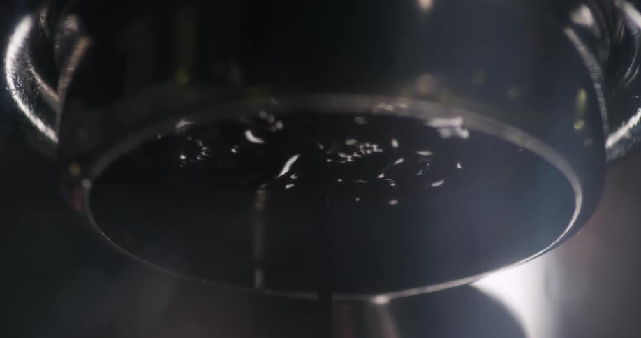 The faucet beings to pour water