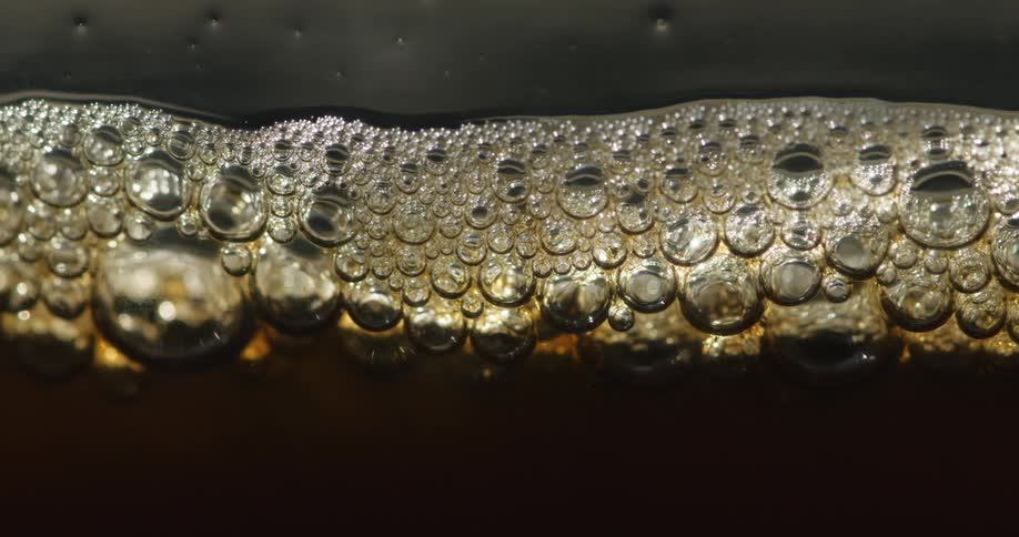 The bubbles float in the drink