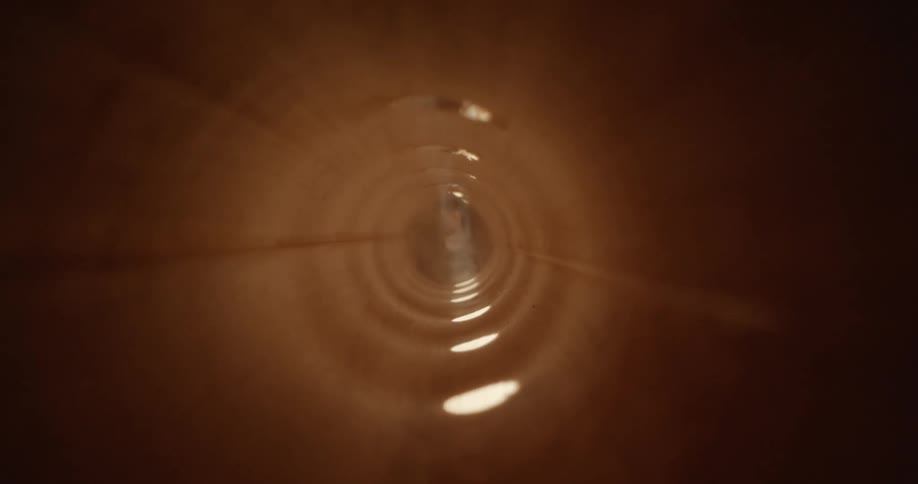 Light flows into tunnel through multiple circular openings brightening it