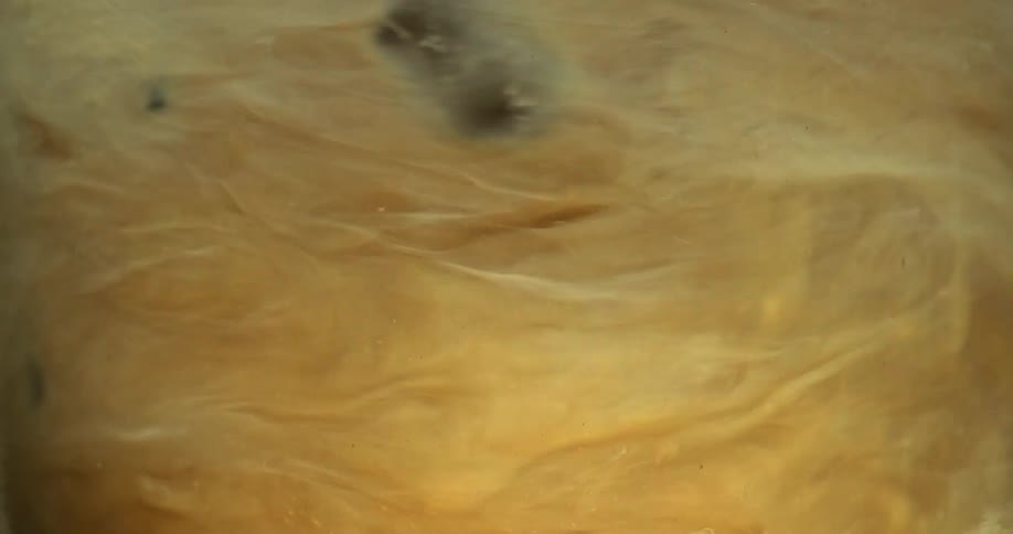 Ice being added to a coffee drink